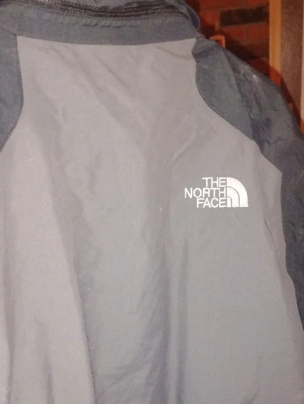 The North Face Men’s Gray and Black Raincoat